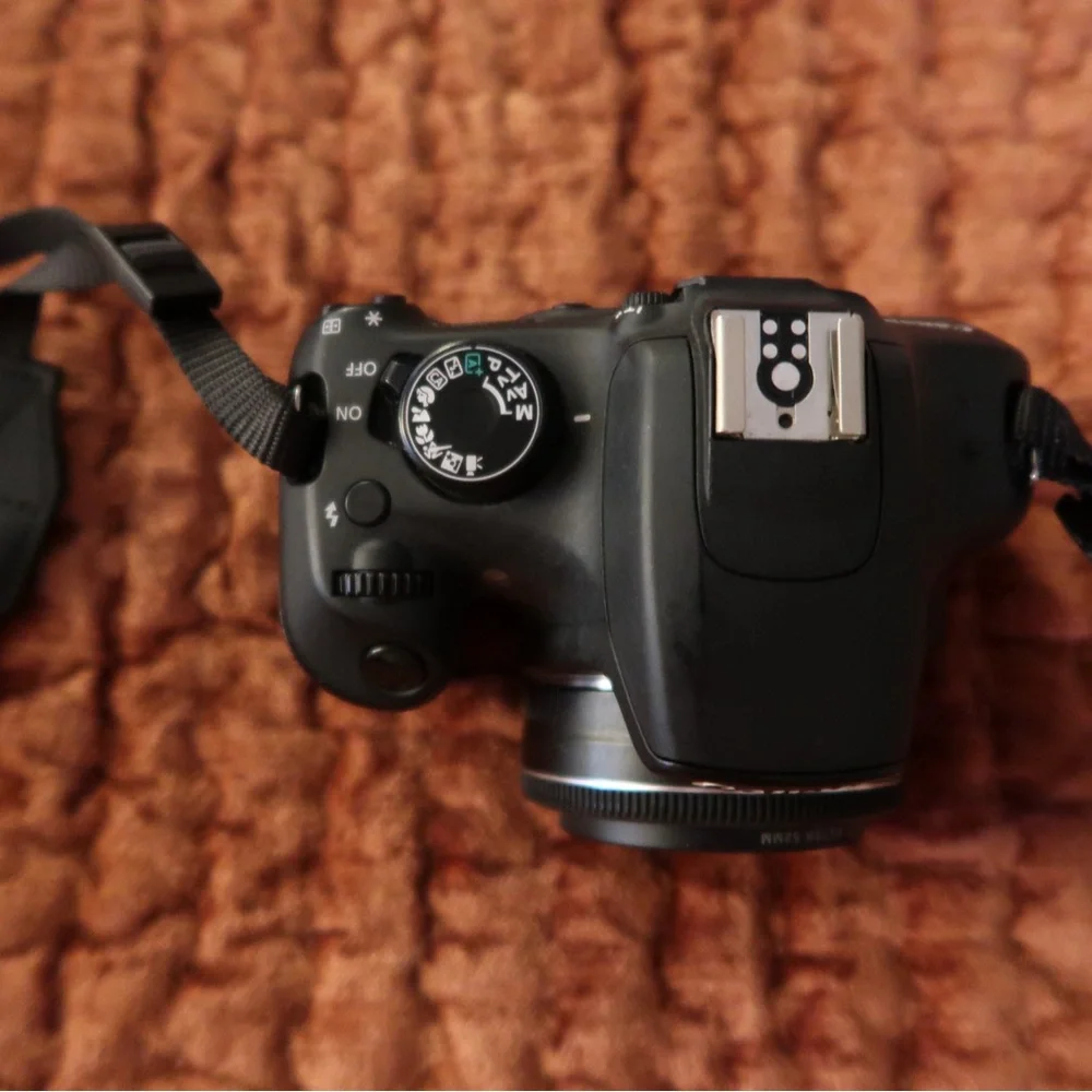 Canon Rebel T5 Body + 24mm Lens